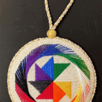 “Swirling Rainbow”stitched by Lisa Green